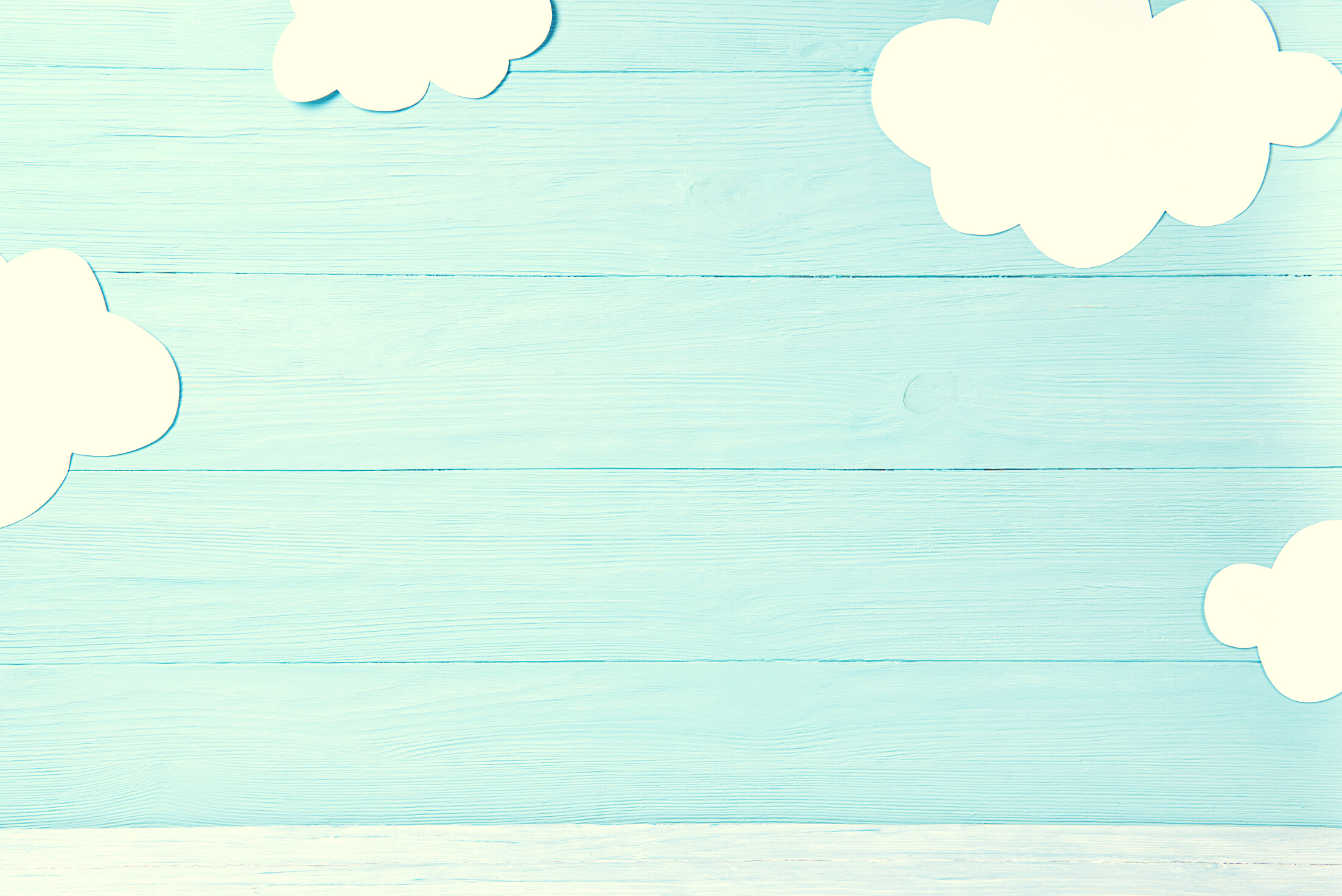 Cute children or baby background, white clouds on the blue wooden background